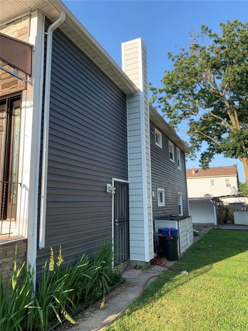 6 2nd Pl, Roosevelt, NY, 11575-1606 | Card Image