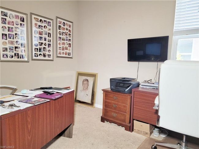 Office area featuring light carpet | Image 25