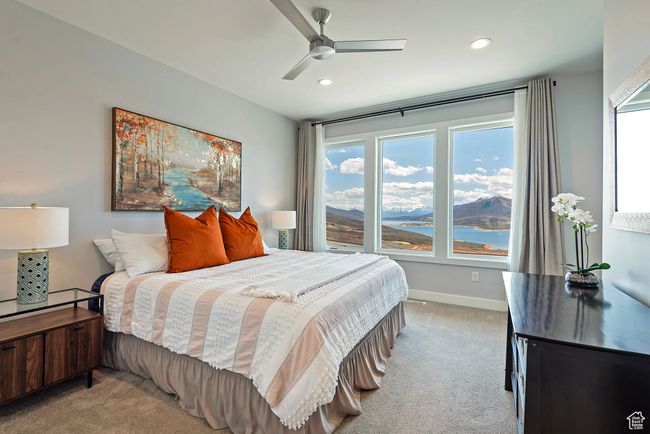 Bedroom with baseboards, light carpet, ceiling fan, and recessed lighting | Image 15