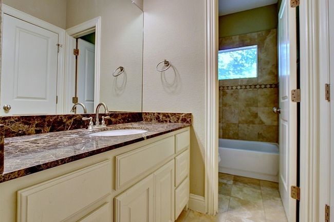 Shared Bathroom with Dual Sinks, Granite Countertop and Enclosed Toilet/Shower/Bath | Image 20