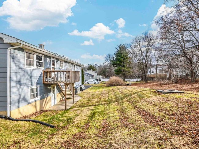 View of yard with a deck | Image 30