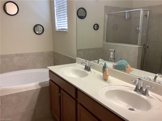 11422 Icarus Cir, House other with 4 bedrooms, 3 bathrooms and 2 parking in LEHIGH ACRES FL | Image 13