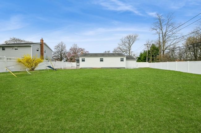 View of yard featuring a fenced backyard | Image 18