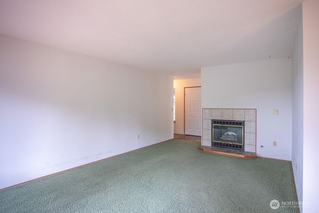 Living room with gas fireplance | Image 8