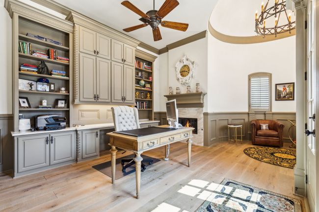 The Office Showcases Elegant Taj Mahal Quartzite and a Custom-Designed Fireplace | Image 15