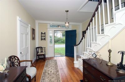 Beautiful entrance, hardwood flooring, new carpet runner on stairs. Fully painted recently. | Image 3