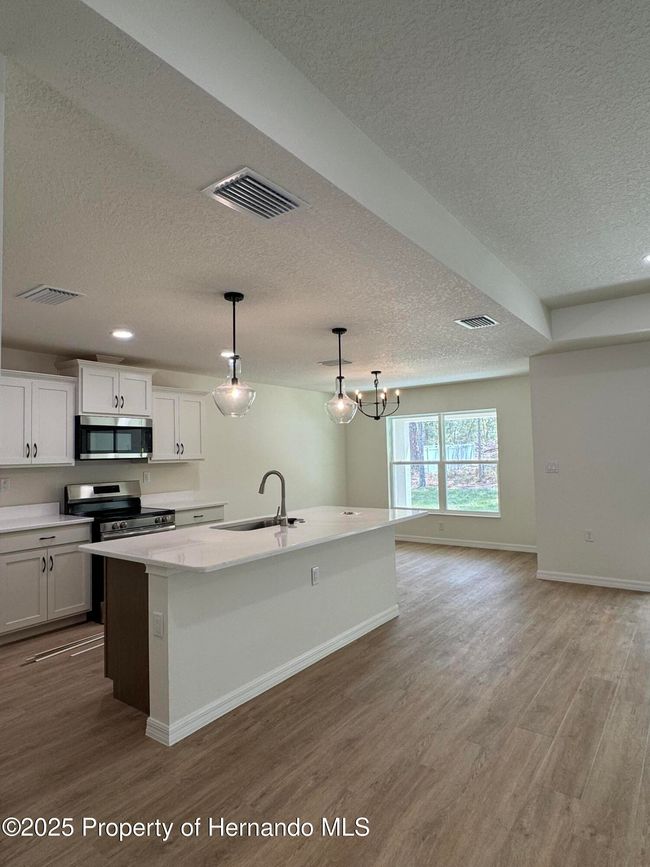 13050 Tinamou Ave, House other with 4 bedrooms, 2 bathrooms and null parking in WEEKI WACHEE FL | Image 5