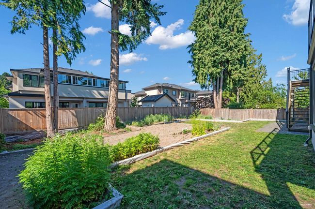 Fenced backyard featuring stairway | Image 37