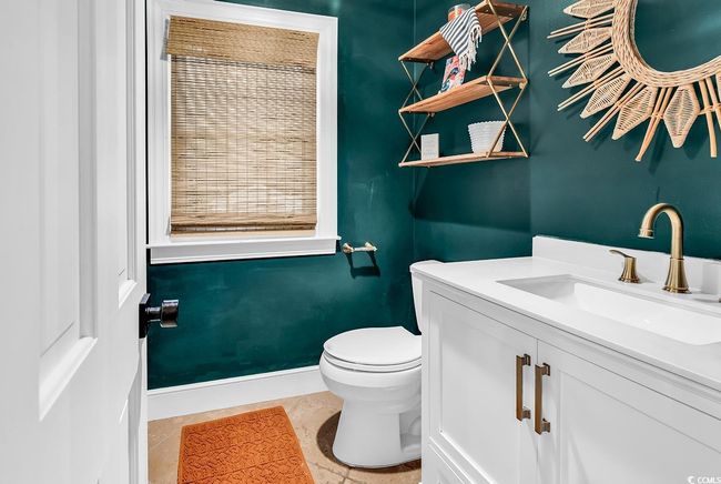 Bathroom with vanity and tile patterned flooring | Image 15