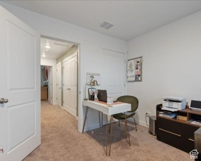 Office area with light carpet | Image 21