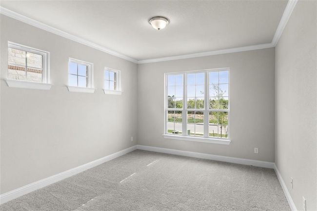 Carpeted empty room featuring ornamental molding and baseboards | Image 5