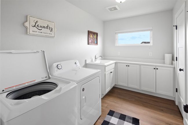 Upper level laundry, utility room, storage. | Image 50