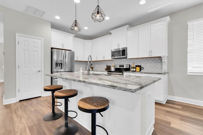 3057 Riders Pass, House other with 4 bedrooms, 3 bathrooms and null parking in ODESSA FL | Image 6