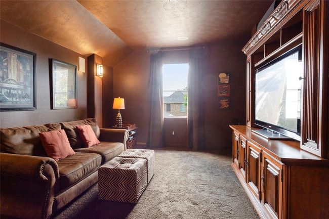 Media room upstairs has door and closet, could be used as a 5th bedroom. | Image 28