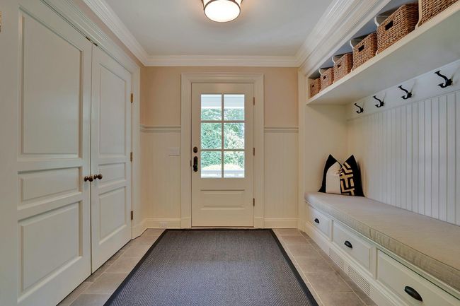 Spacious mud room w. built-in cabinetry and bead board accent moldings | Image 14