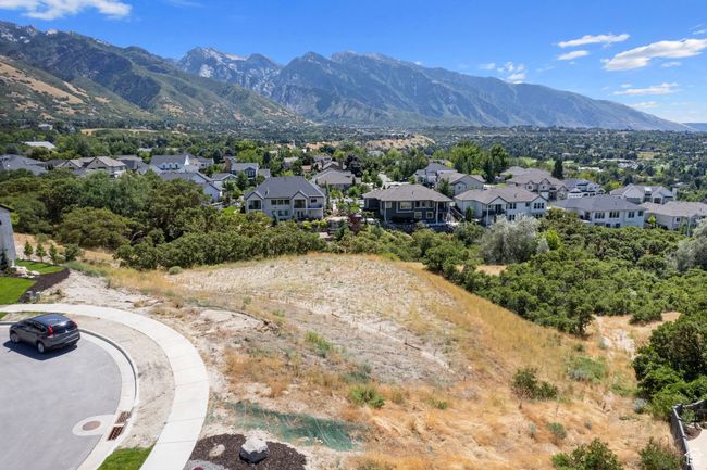 View of mountain backdrop with nearby suburban area | Image 29