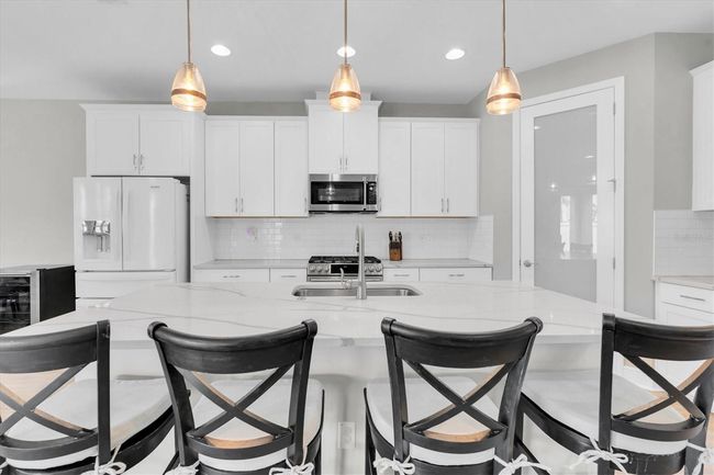 4056 Burdick Loop, House other with 6 bedrooms, 4 bathrooms and null parking in ODESSA FL | Image 4