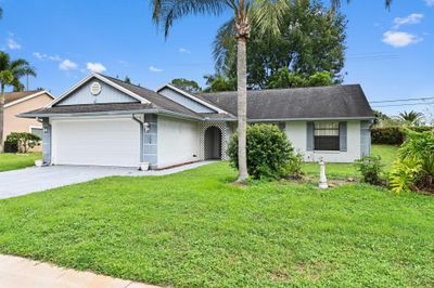 106 Sherwood Drive, House other with 3 bedrooms, 2 bathrooms and null parking in Royal Palm Beach FL | Image 2