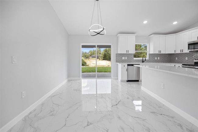 dinning and back covered porch | Image 28