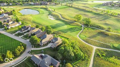 Spacious .45 acre lot overlooking #8 green and #9 tee box with convenient access to the practice areas. | Image 1