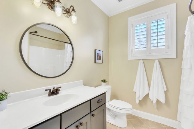 Another full bathroom is available with tub/shower combo for the upstairs bedrooms. | Image 42