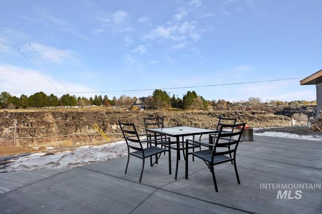 View of patio / terrace featuring outdoor dining area | Image 48
