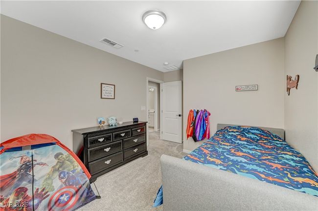Bedroom featuring carpet floors and baseboards | Image 44