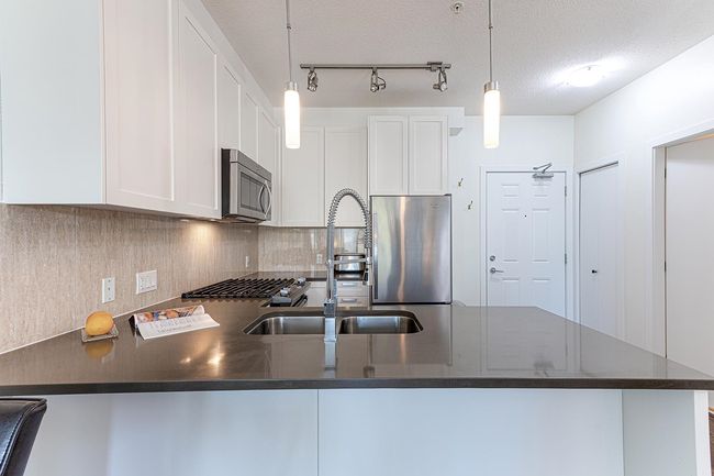 310 - 12409 Harris Rd, Condo with 2 bedrooms, 1 bathrooms and 1 parking in Pitt Meadows BC | Image 4