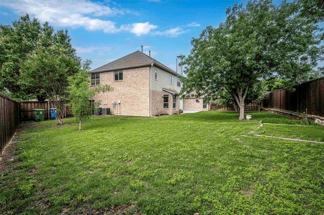 View of yard with a fenced backyard and central air condition unit | Image 24