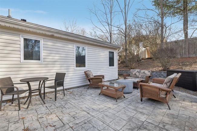 View of patio / terrace featuring an outdoor hangout area and fence | Image 27