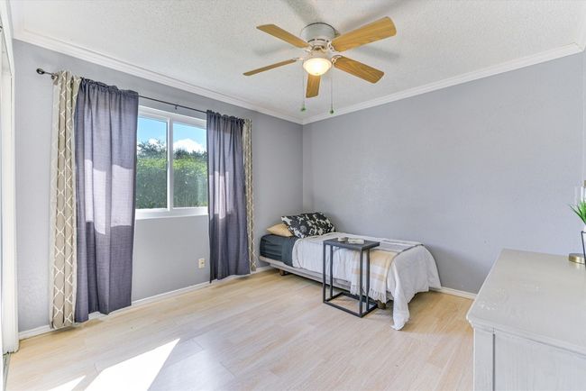 Each guest bedroom offers plenty of space and natural light, making them perfect for visitors, hobbies, or a dedicated workspace | Image 14