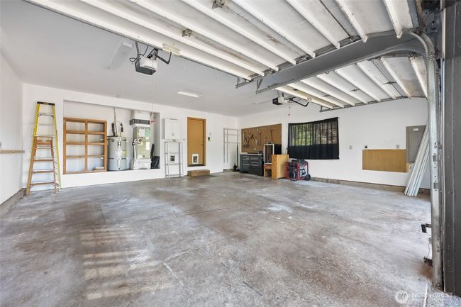 Nicely sized garage with generator hook up and generator (included). | Image 39