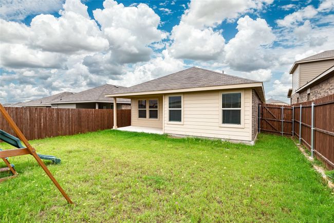 Back of property with a patio and a shingled roof | Image 36