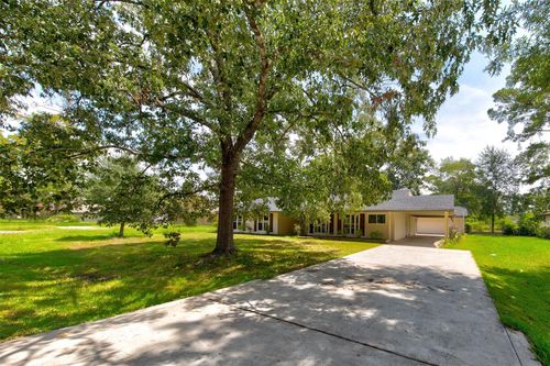 1302 Burning Tree Rd, Kingwood, TX, 77339-3928 | Card Image