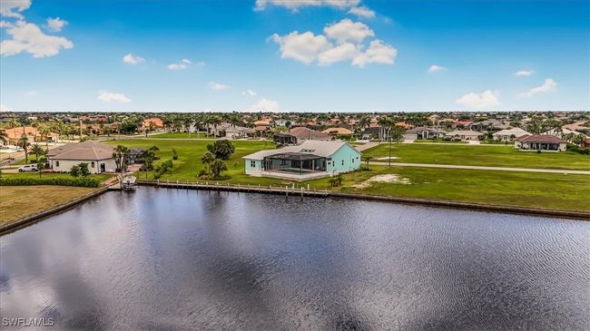 Aerial perspective of suburban area with a large body of water | Image 37
