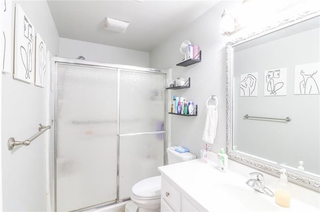 Bathroom featuring vanity and a stall shower | Image 27