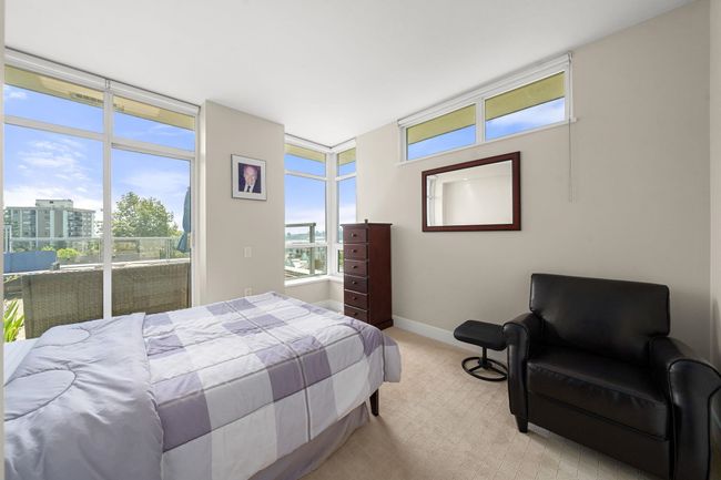 Bedroom with light colored carpet and baseboards | Image 20