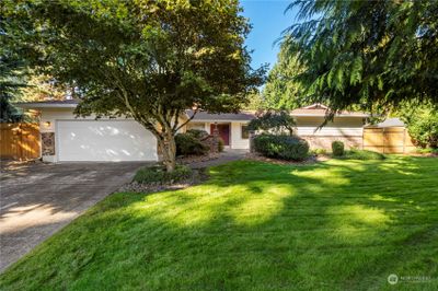 Beautifully landscaped yard in desirable location. | Image 1