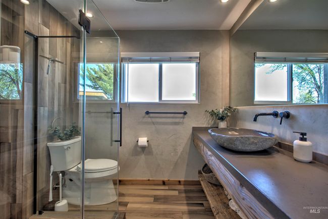 Bathroom with vanity, a stall shower, wood finished floors, and recessed lighting | Image 15