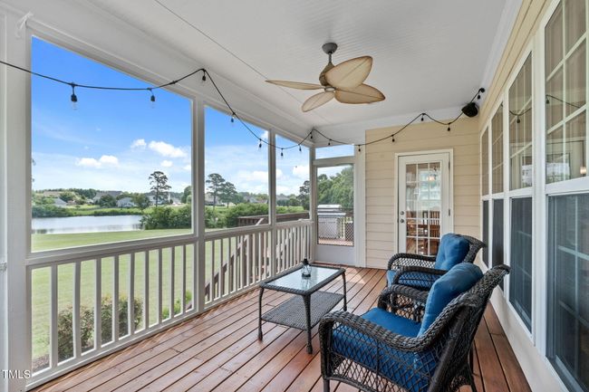 Screened Porch Overlooks Tranquil Pond | Image 42