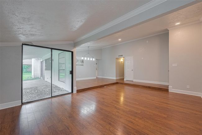 View of the formal living area which could also be a home office or playroom/game room | Image 5