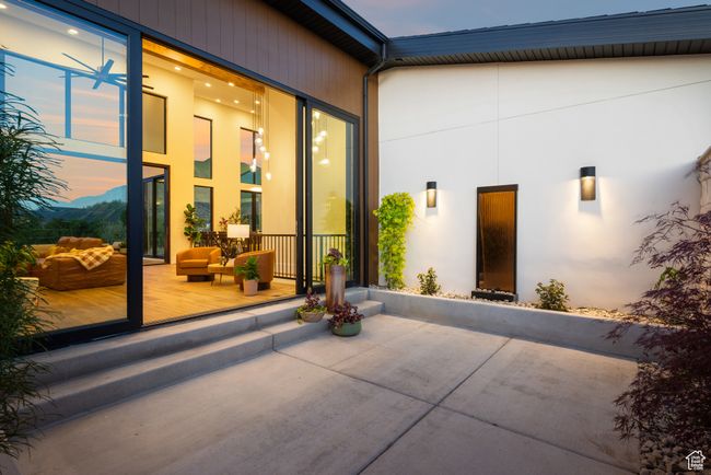Property entrance featuring a patio area and outdoor lounge area | Image 19