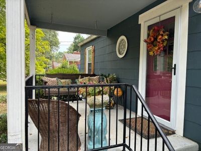 Picture perfect cozy front porch. | Image 3