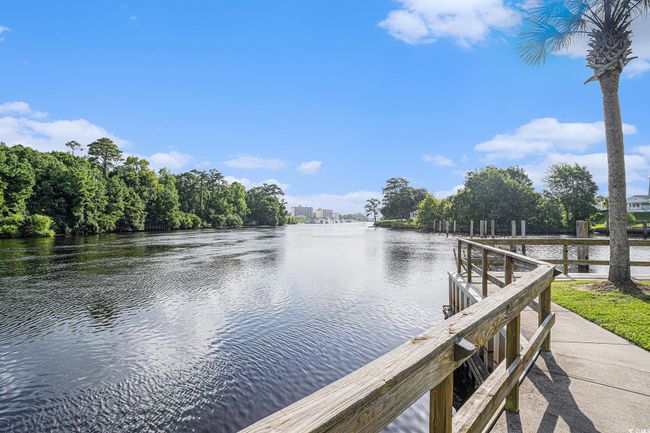 Dock featuring a water view | Image 26