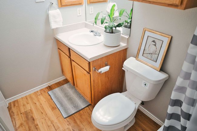 Bathroom with vanity and wood finished floors | Image 23