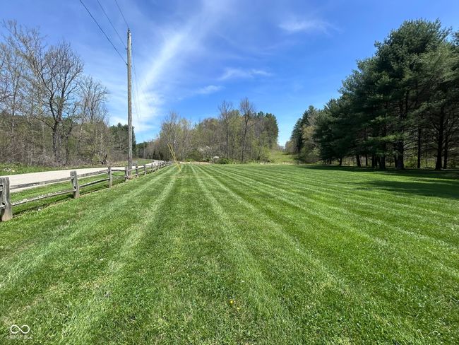 view of yard featuring fence and a rural view | Image 25