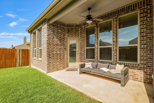 View of patio / terrace featuring ceiling fan and an outdoor living space | Image 37