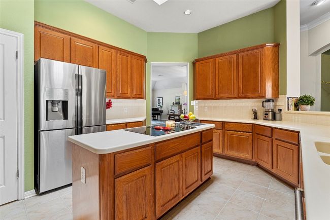 Wood cabinetry offers ample storage for all your kitchen essentials | Image 14