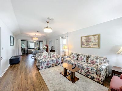 As you enter, you are greated with this great living room. | Image 2