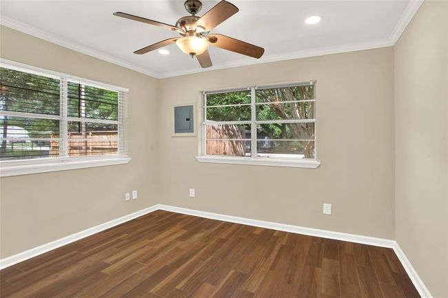 bedroom 2 with window views to street and back yard | Image 20